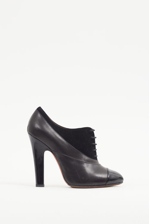 Alaïa Black Leather & Suede Lace Up Bootie