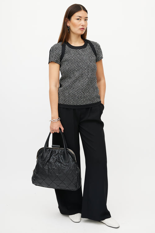 Chanel 2006 Black & Silver Expandable Zip Around Leather Bag