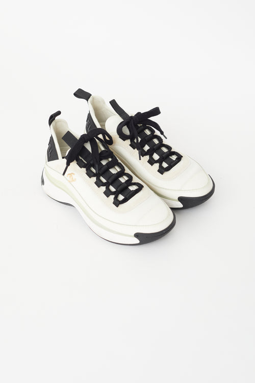Chanel Cream & Black Logo Sneaker