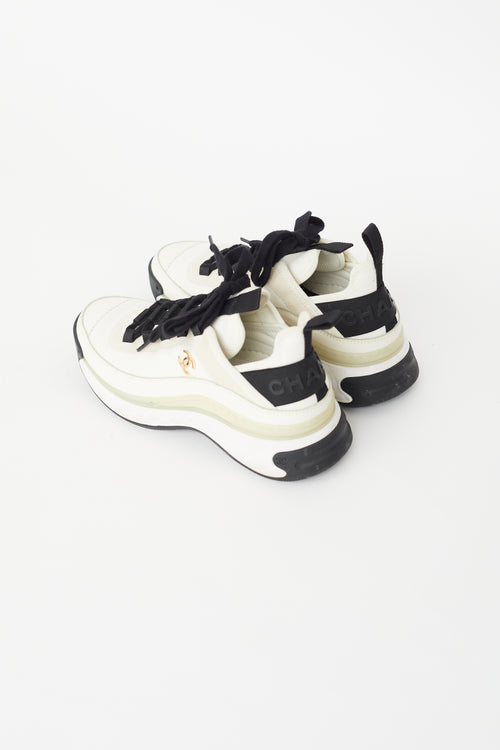Chanel Cream & Black Logo Sneaker