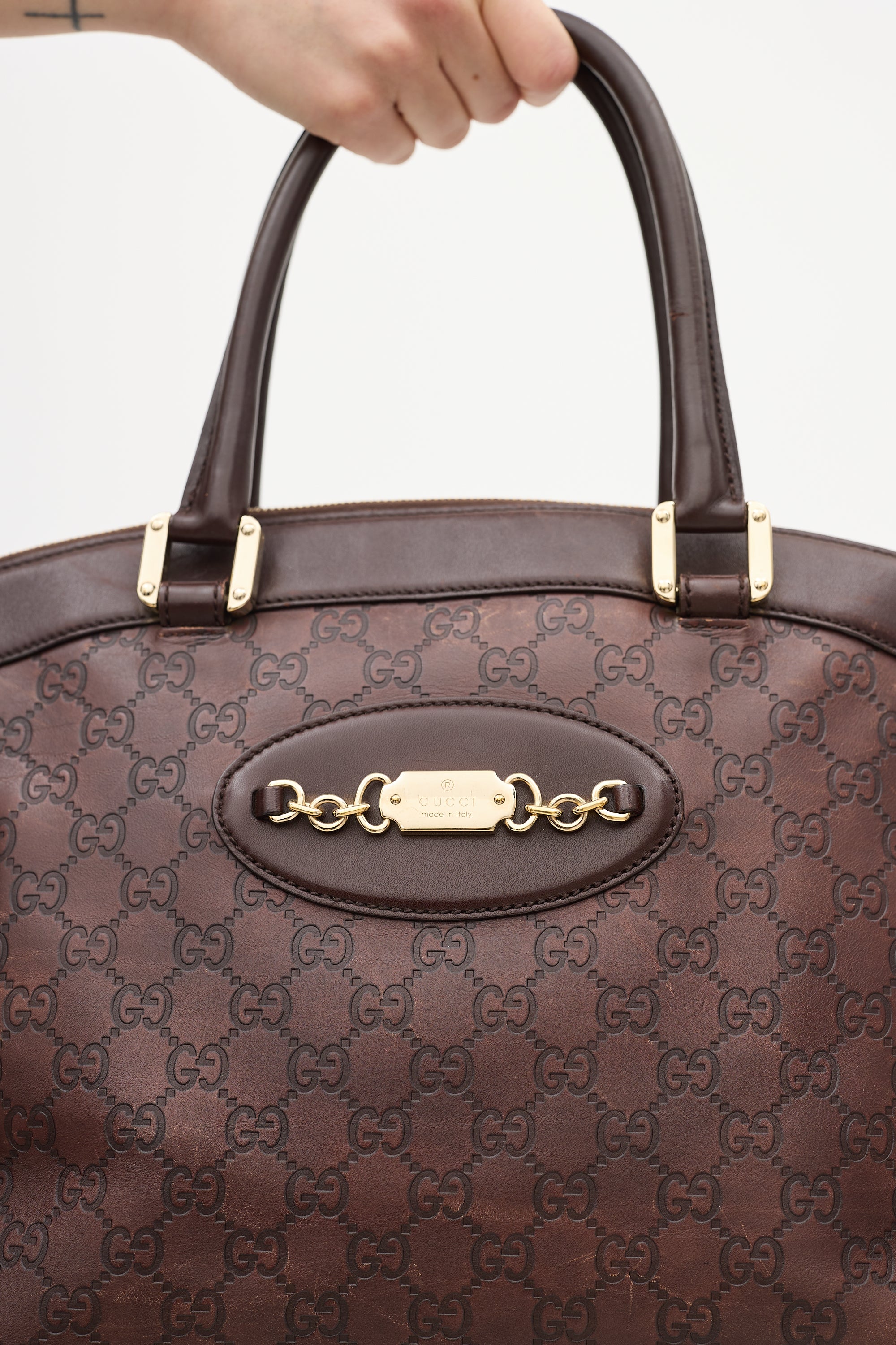 Gucci Brown Leather Monogram Embossed Bag