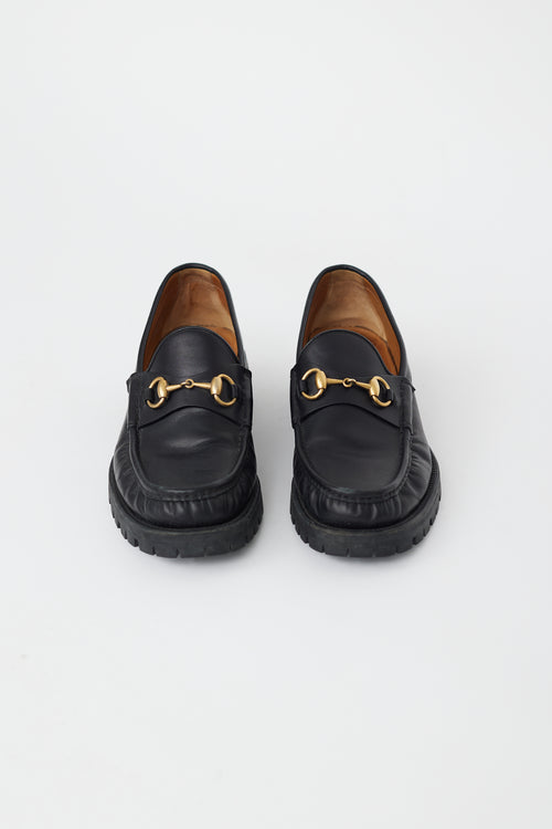 Gucci Black Leather & Gold Hardware Lug Loafer