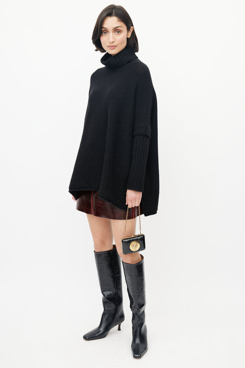 Gucci Black & Gold Leather Clutch