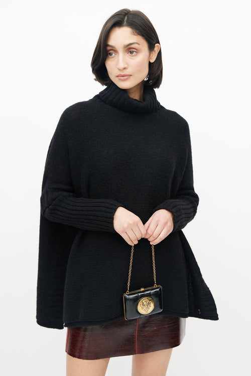 Gucci Black & Gold Leather Clutch