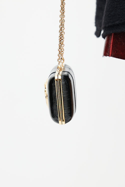 Gucci Black & Gold Leather Clutch