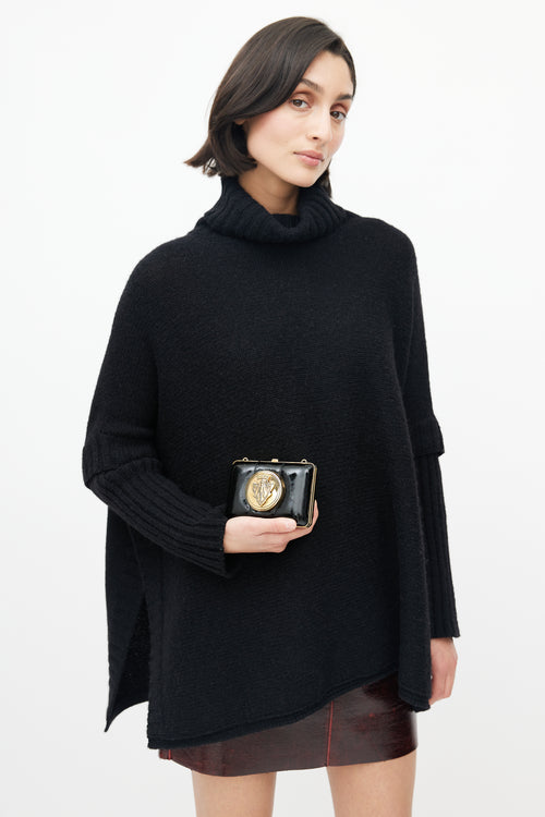 Gucci Black & Gold Leather Clutch