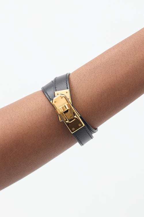 Hermès 2003 Black & Yellow Gold Leather Kelly Double Tour Bracelet