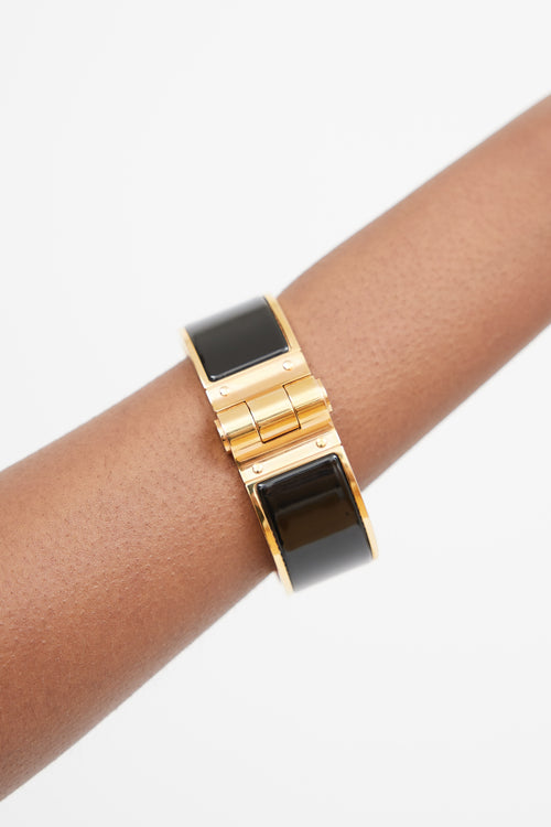 Hermès Black & Gold Hinged Bracelet