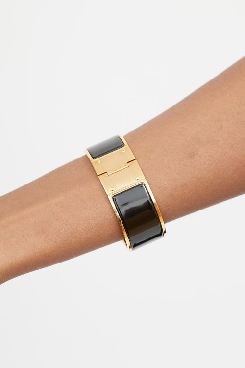 Hermès Black & Gold Hinged Bracelet