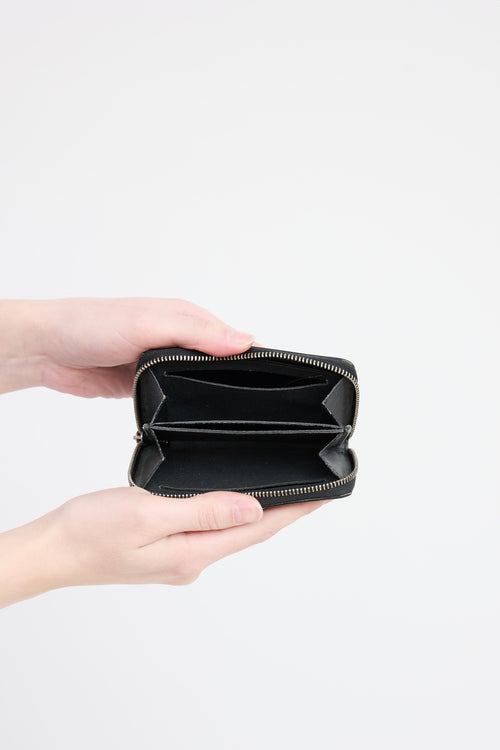 Louis Vuitton Taiga Zip Coin Purse