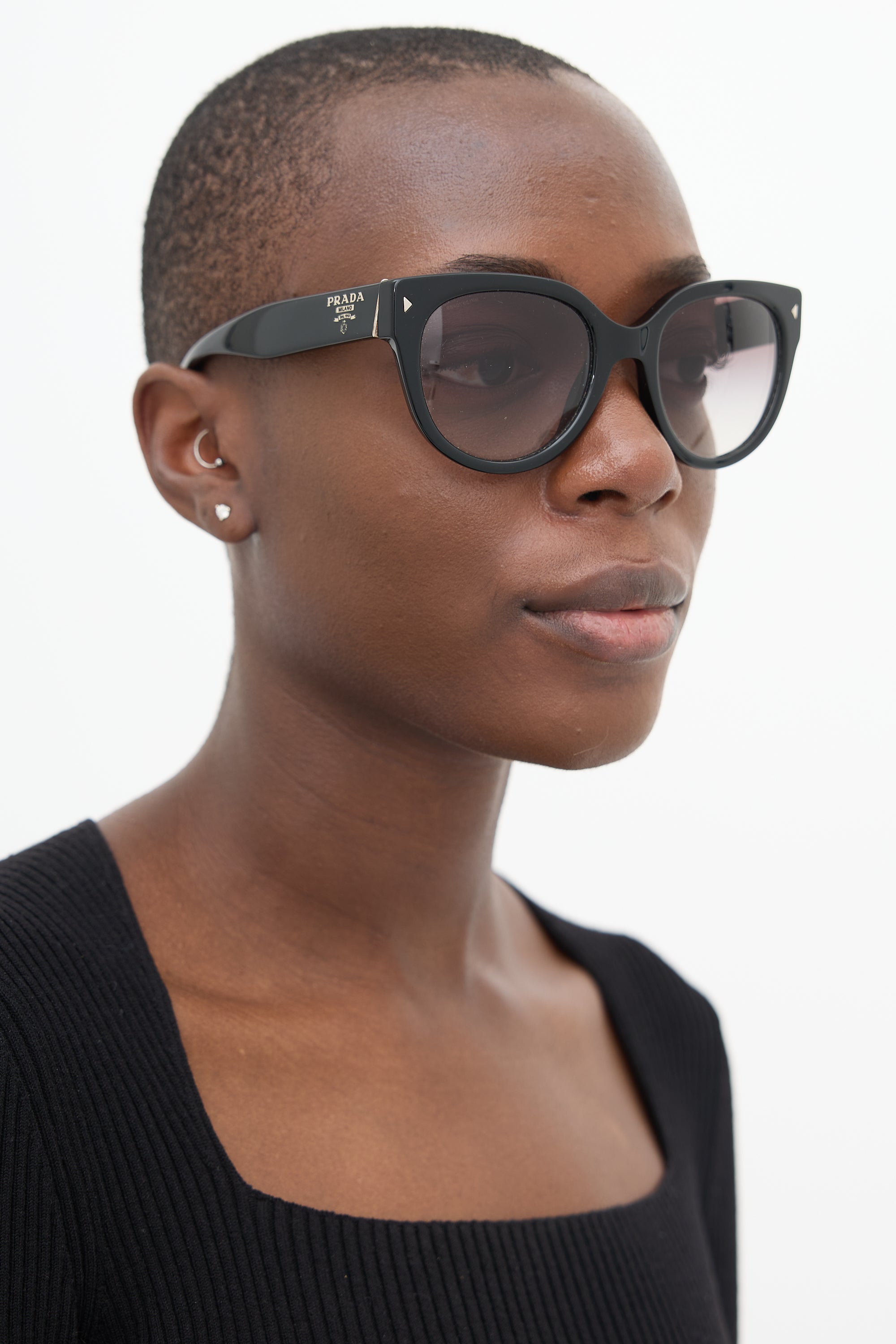 Prada SPR 170 Round Sunglasses