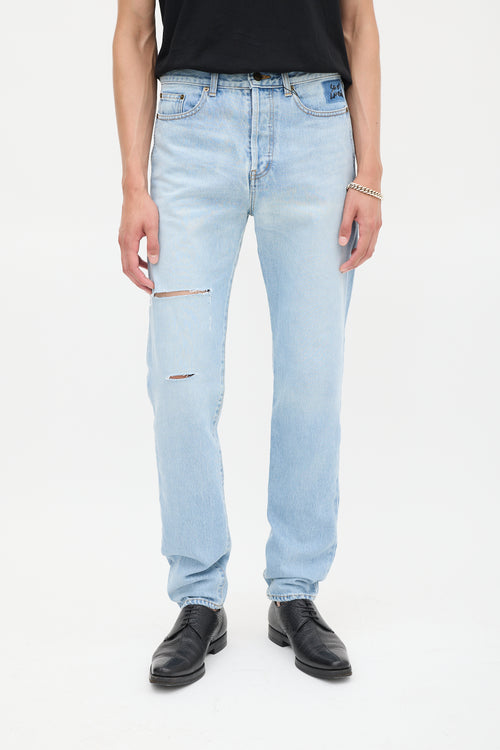 Saint Laurent Light Wash Distressed & Embroidered Slim Jeans