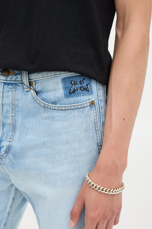 Saint Laurent Light Wash Distressed & Embroidered Slim Jeans