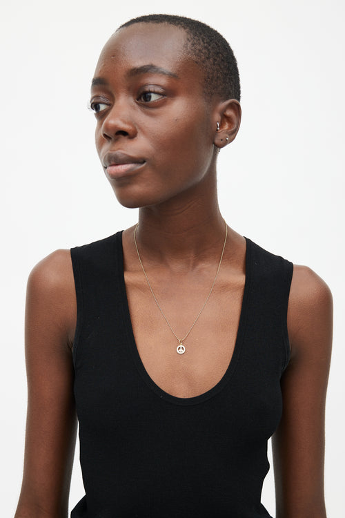 Tiffany & Co. 18k Gold & Diamond Peace Necklace