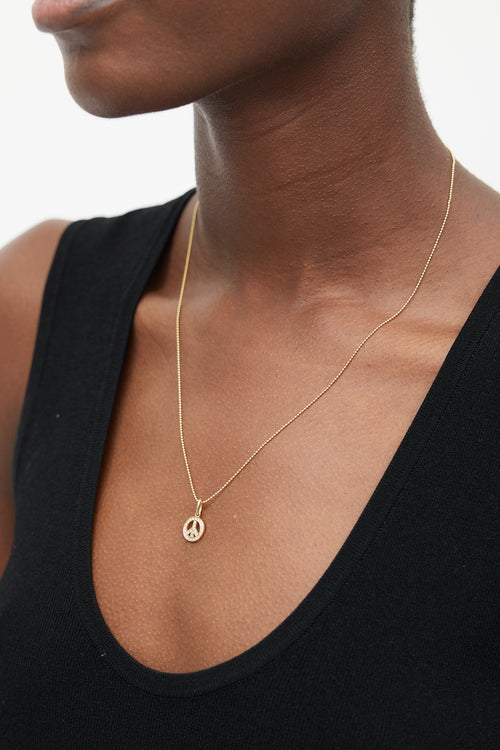 Tiffany & Co. 18k Gold & Diamond Peace Necklace